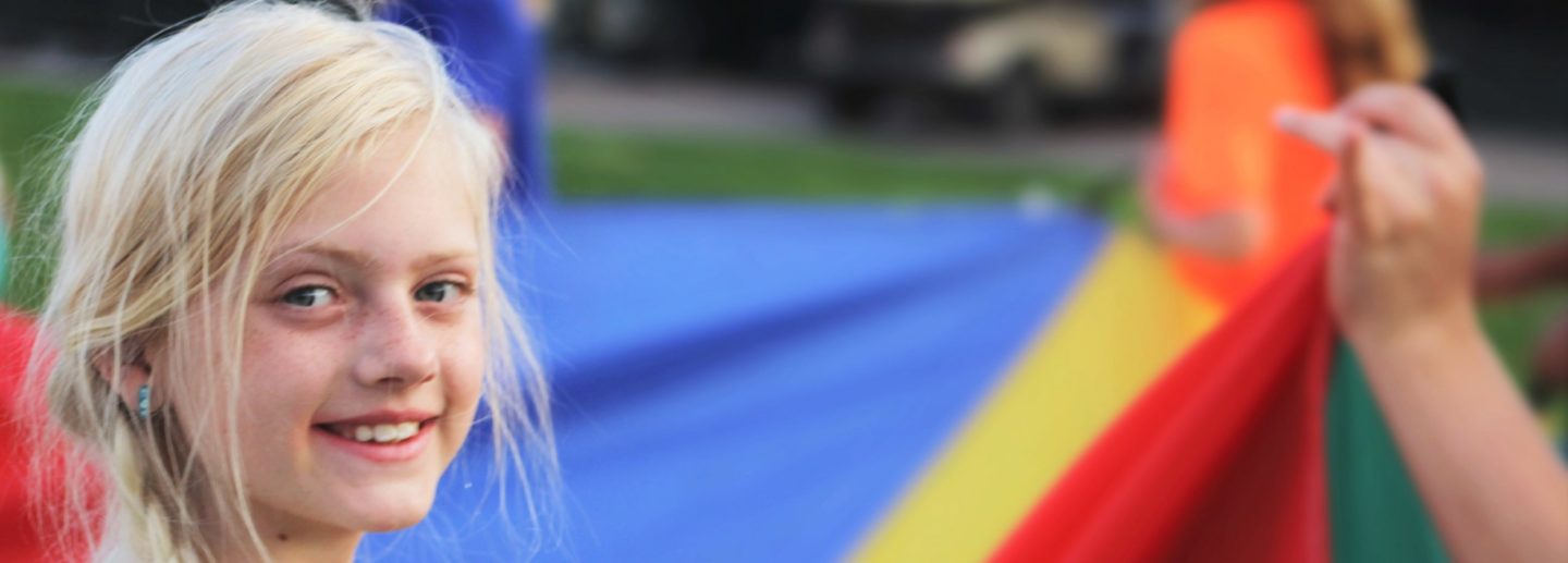 A young camper at free summer camp for kids, supported by events and fundraising