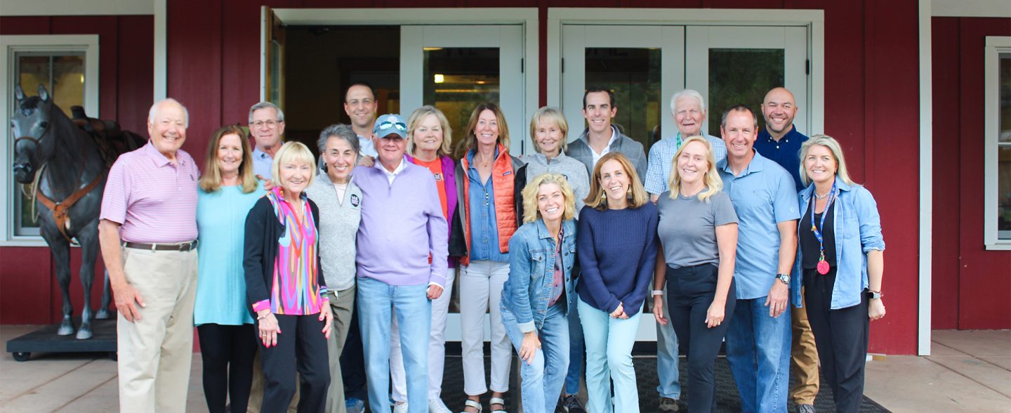 The Board of Directors of Colorado River Ranch free summer camp poses for a group photo to promote the Colorado summer camp